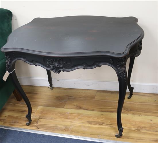 A late Victorian green dralon upholstered armchair